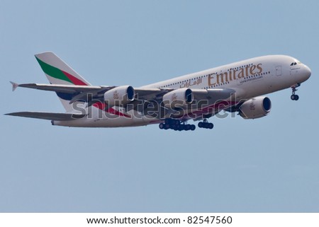 NEW YORK - MAY 24: A A38 Emirates approaches JFK airport in New York, USA on May 24, 2011. As of 2011 the A380 is the biggest commercial airplane and the newest plane built by Airbus company