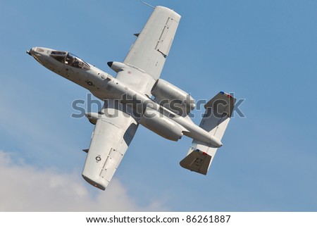 WASHINGTON - MAY 9:A-10 Warthog performing air show demo showing capability and characteristic of A-10 Thunderbolt II on May 9, 2011 in Washington. A-10 is close air support jet called Tank Buster