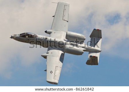 WASHINGTON - MAY 9:A-10 Warthog performing air show demo showing capability and characteristic of A-10 Thunderbolt II on May 9, 2011 in Washington. A-10 is close air support jet called Tank Buster