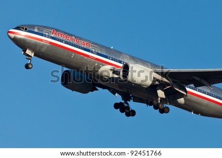 NEW YORK - DECEMBER 21:Boeing 777 American Airline approaches JFK in New York, USA on December 21, 2011 American Airline is on of the oldest American airlines and one of the biggest in the world