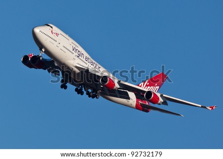 NEW YORK - JANUARY 2: Boeing 747 Virgin Atlantic approaches JFK Airport in New York on January 2, 2012 Plane is wearing new livery announced in early 2011 Boeing 747 is popularly called Jumbo Jet