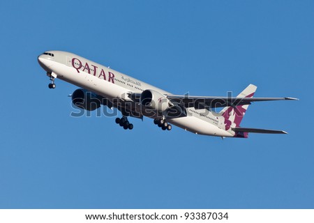 NEW YORK - JANUARY 5:Boeing 777 Qatar on final approach to JFK in New York, USA on JANUARY 5, 2012 Qatar Airline is rated 3rd best airlines in the world Qatar airline is flag carrier airline of Qatar