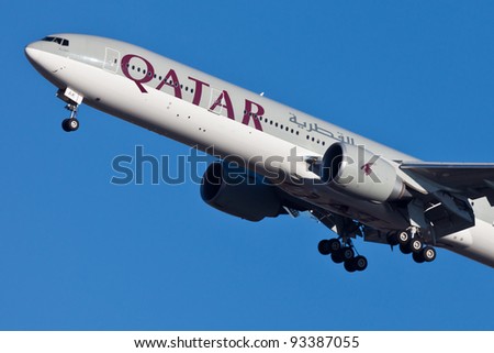 NEW YORK - JANUARY 5:Boeing 777 Qatar on final approach to JFK in New York, USA on JANUARY 5, 2012 Qatar Airline is rated 3rd best airlines in the world Qatar airline is flag carrier airline of Qatar
