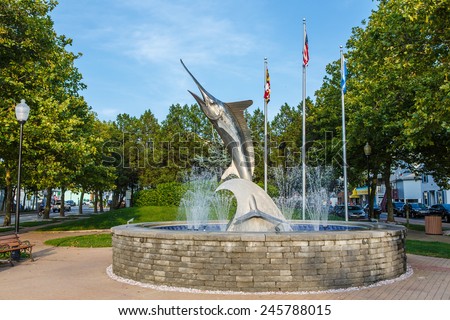 OCEAN CITY - JULY 21:  White Marlin Sculpture Fountain in Entry Park in Ocean City, MD on July 21, 2014. This 14-foot stainless steel White Marlin was created by eastern shore artist, Paul Lockhart.