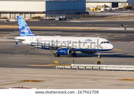 NEW YORK - NOVEMBER 3: Airbus A320 JetBlue taxis at JFK Airport in New York, NY on November 3, 2013. A320 was the first narrow body airliner from Airbus. It is the biggest competition to Boeing 737.
