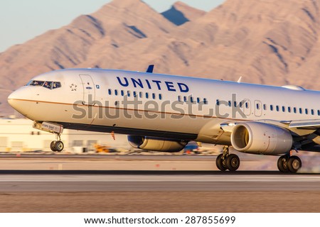 LAS VEGAS - NOVEMBER 3: Airbus A320 United Airlines lands at McCarran Airport in Las Vegas, NV on November 3 2014. United is a major US airline. It has the worlds most rewarding loyalty program.