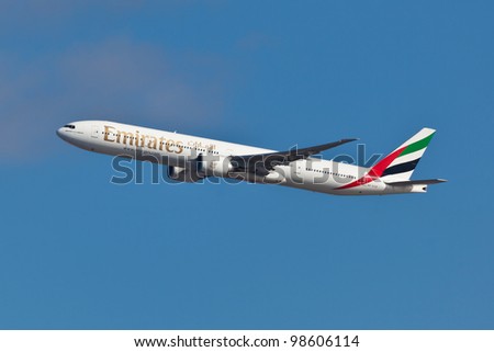 NEW YORK - MARCH 10: Boeing 777 Emirates climbs after take off from JFK airport located in New York March 10, 2012 Emirates is rated as a top10 best airline in the world flying on youngest fleet