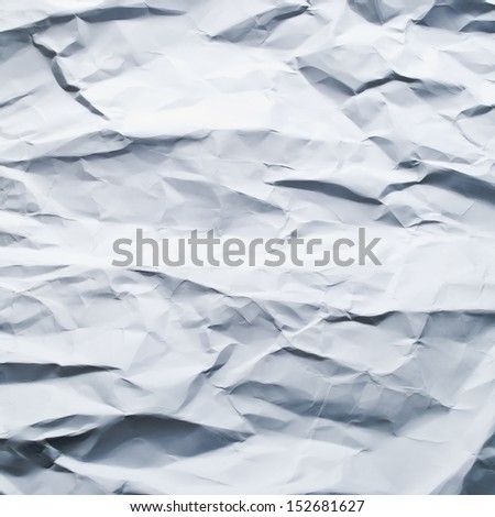 Abstract texture from sheet of white crumpled paper