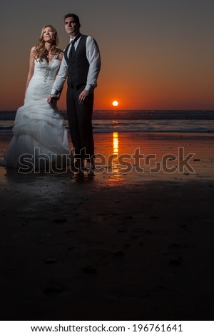 Happy bride and groom on a beautiful beach. Wedding Couple, Happy romantic bride and groom in love