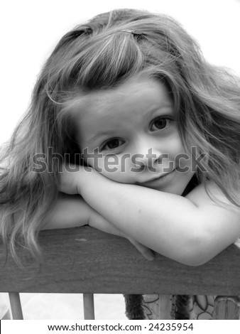 stock photo A beautiful portrait of a sweet girl leaning on the back of a