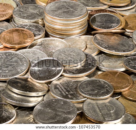Macro image in deep focus of a pile of USA currency coins in stacks