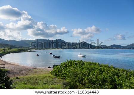 View in St Martin at Baie de l Embouchure with boats moored in lines