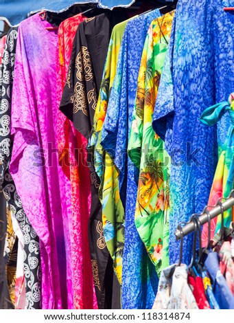 Close up of details of colorful clothing on street market stall