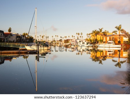 Residential development by water in Ventura California with modern homes and yachts boats