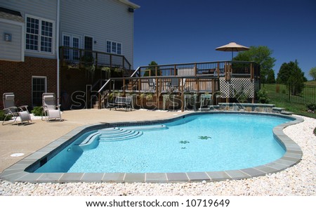 backyard pool in rear of modern house in suburbs stock photo backyard pool 450x299 stock photo backyard pool in rear of modern house in suburbs 10719649 Backyard Pool