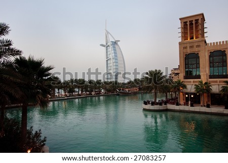 DUBAI, UAE - FEB 24: The Burj al Arab Hotel is shown as night falls on Feb 24, 2009 in Dubai. At 321 metres (1,053 ft), the hotel was built on an artificial island.