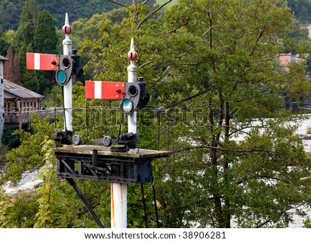 Railway signals at stop using the obsolete semaphore system in Llangollen in Wales
