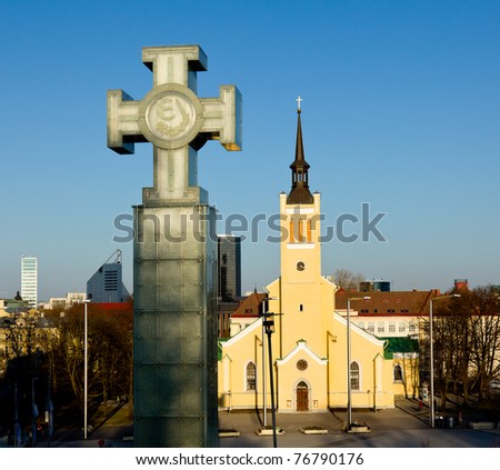 Capital of Estonia, Tallinn is famous for its World Heritage old town walls and cobbled streets. St. John's Church is in Freedom Square with the Glass Cross commemorating freedom from the Soviets