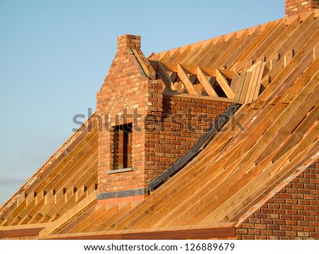 Roof construction showing wooden structure.