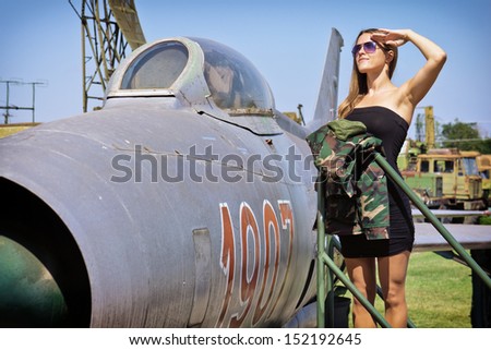 Salute to the veteran / Beautiful young woman salute to the veteran fighter bomber