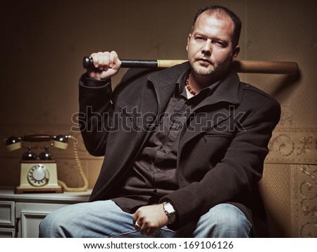 Bad guy / Vintage style photo from a bad guy with a baseball bat