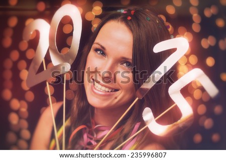 Happy new year / Young woman in a new year party