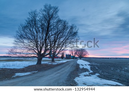 Cold sunrise in Ontario countryside farm, path to farm house