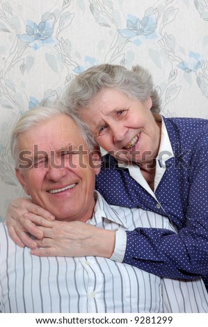 happy old couple laugh until one cries