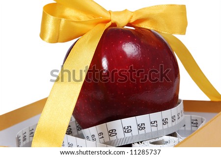 red apple in box with tape-line like gift