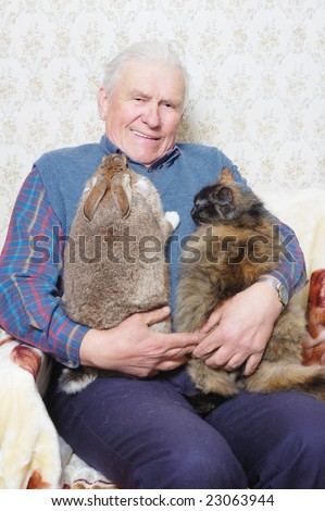 old man hold bunny and cat on the hand