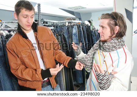friends in wear shop doing choice