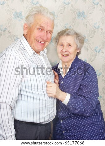 happy senior couple laugh