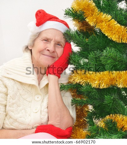 stock-photo-granny-in-red-santa-claus-hat-and-red-mittens-snow-maiden-66902170.jpg