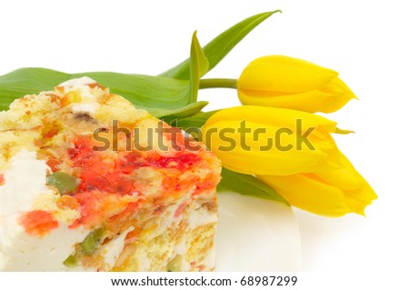 dessert, fancy cake and yellow tulip, isolated on white