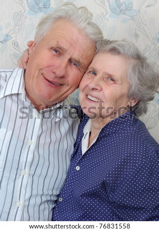 happy old couple laugh until one cries