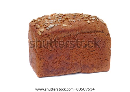 ruddy long loaf of bread with sunflower seeds, isolated on white background