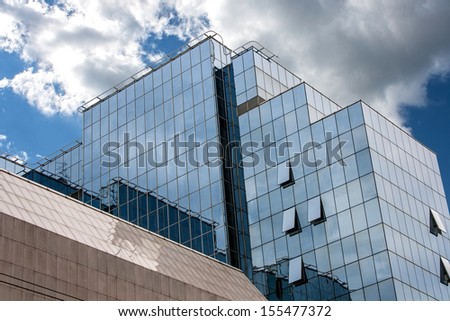 The combination of modern materials and colors of the modern business building