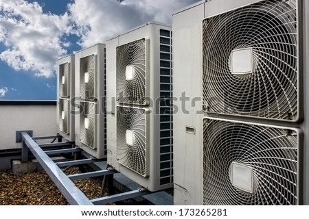 Air conditioning system assembled on top of a building.