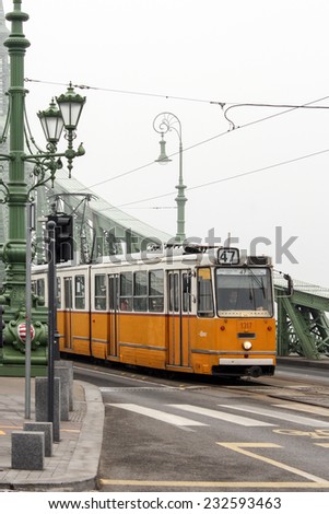 Budapest, Hungary - January 3, 2014: No 47 tram passing by Budapest. Old yellow tram in Budapest, Hungary.