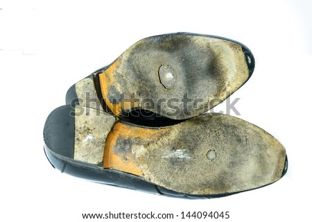 worn sole of shoes isolated on white background