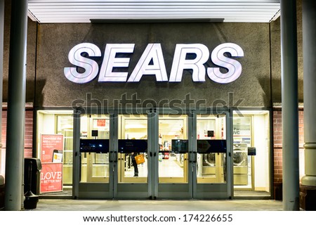NATICK-  JANUARY 31: The entrance of a Sears department store on January 31, 2014 in Natick Mall. The company was founded by Richard Warren Sears and Alvah Curtis Roebuck in 1893.