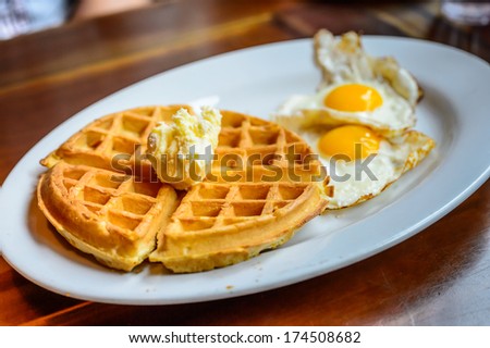 Waffle with eggs.