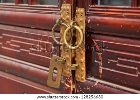 closeup of pictures, knocker iron metal on the wood door