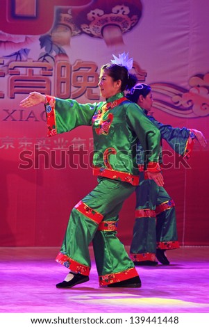 LUANNAN COUNTY - FEBRUARY 22: During the Chinese Lantern Festival evening party, Shadow dance performance in the stage, on February 22, 2013, Luannan County, Hebei Province, China.