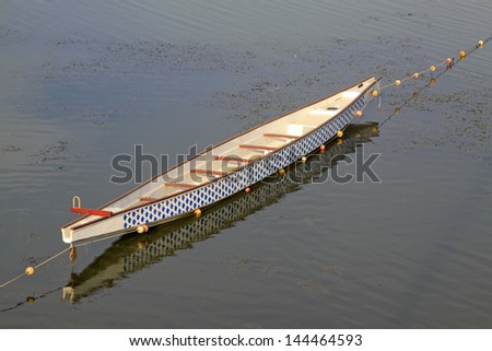 Dragon boat anchored in the water, north china
