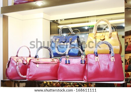 TANGSHAN - NOVEMBER 16: Ms color bag were put on the shelf in a store, on November 16, 2013, tangshan city, hebei province, China.