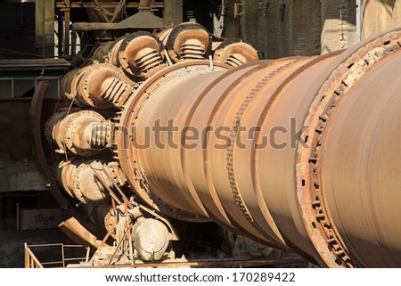 abandoned rotary kiln in the Qixin cement plant on november 4, 2013, tangshan city, hebei province, China.