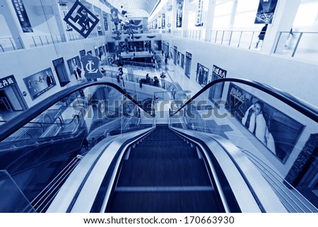 TANGSHAN CITY - NOVEMBER 16: The elevators and indoor decoration, in a large stores, on november 16, 2013, tangshan city, hebei province, China.