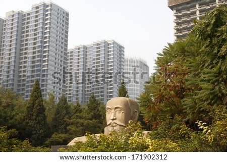 TANGSHAN, CHINA - OCTOBER 18: The statue of Mr Li Dazhao, the founders of communist party of China in the DaZhao Park, on October 18, 2013, tangshan city, hebei province, China.