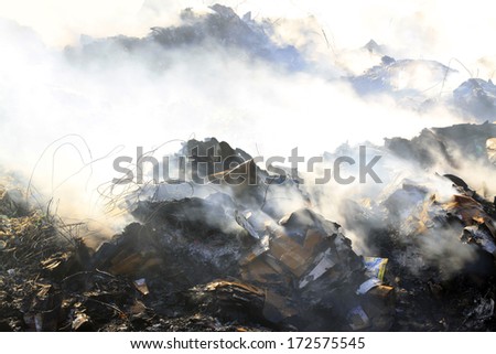 The wet cardboard  not fully burning in the scene of the fire, November 20, 2013, tangshan city, hebei province, China.